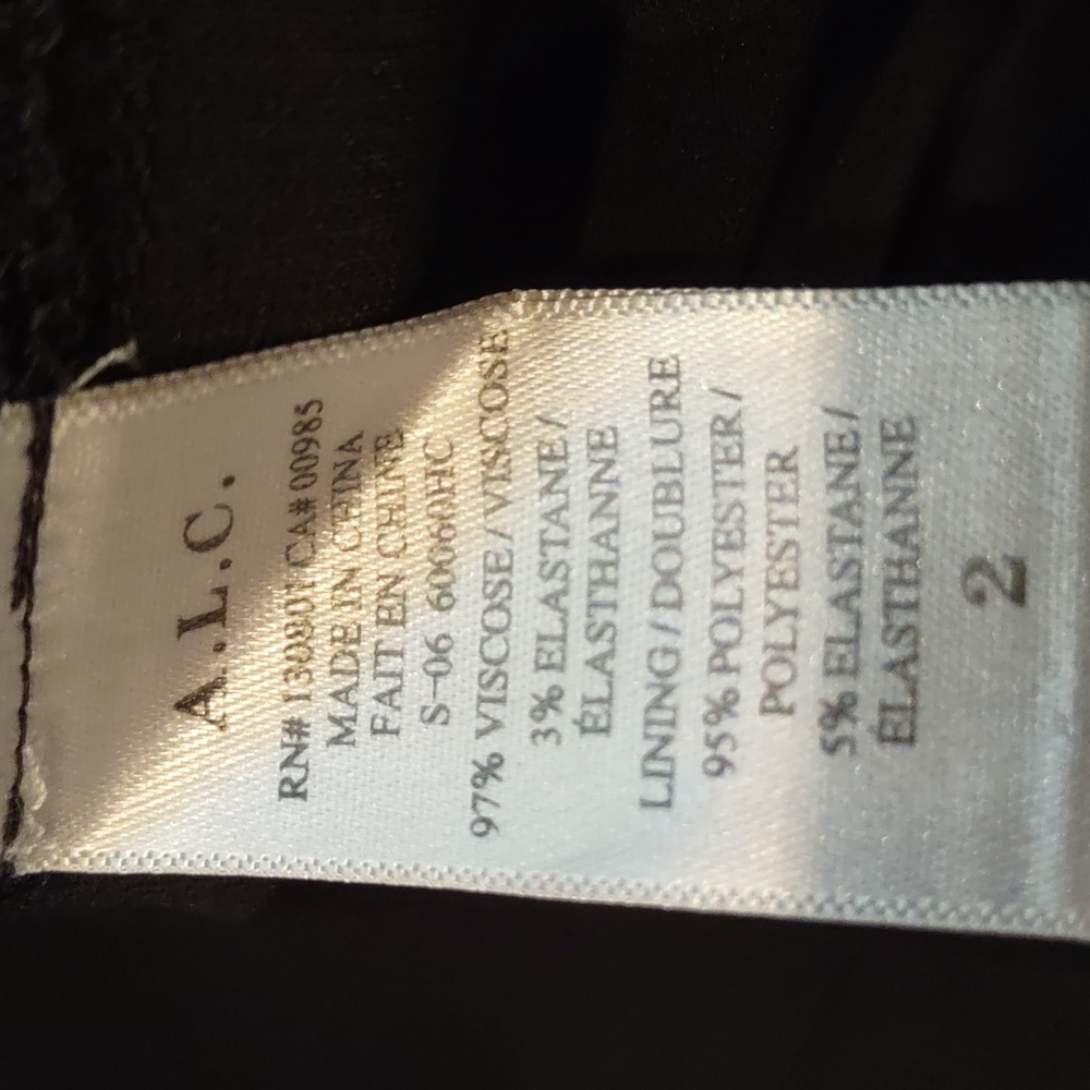 A.L.C. Jacobson black sleeveless deep-v dress. Metal bar detail at waist. Size 2 - Picture 10 of 14